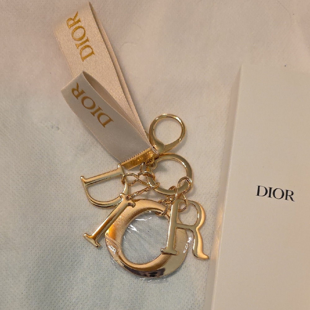 Dior Gold Letter Charm Keychain with Cream Logo Ribbons